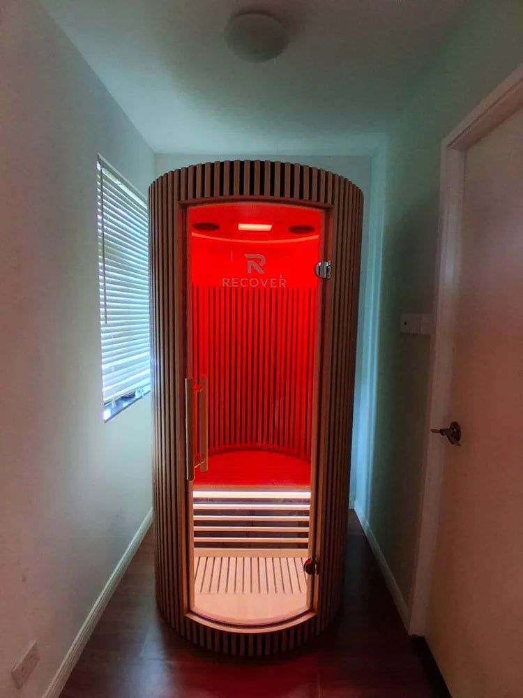 R Sauna Circle glowing red in a home hallway