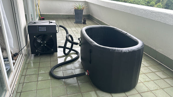 Customer using cold plunge tub outdoors