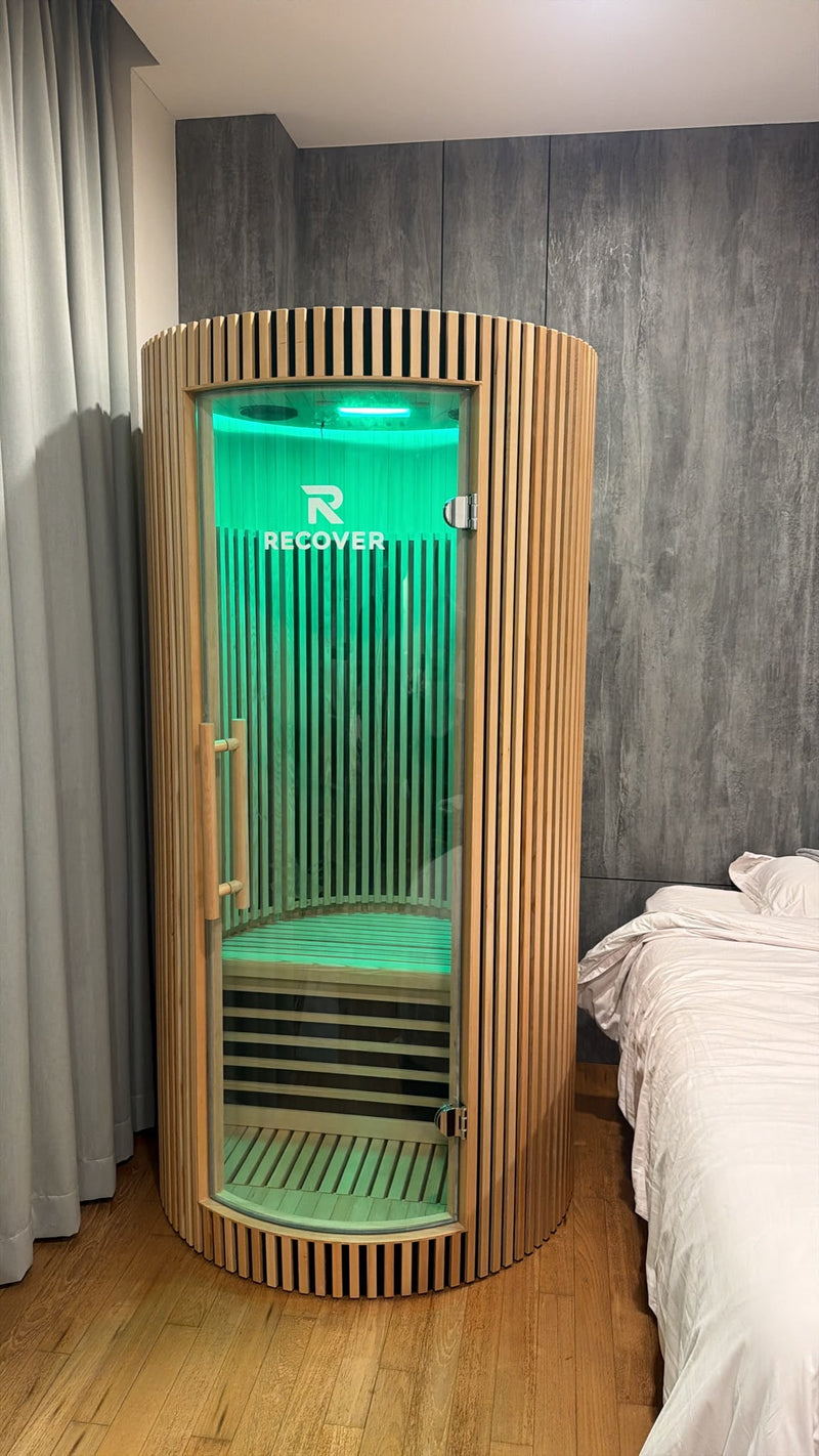 R Sauna Circle in green light in a bedroom