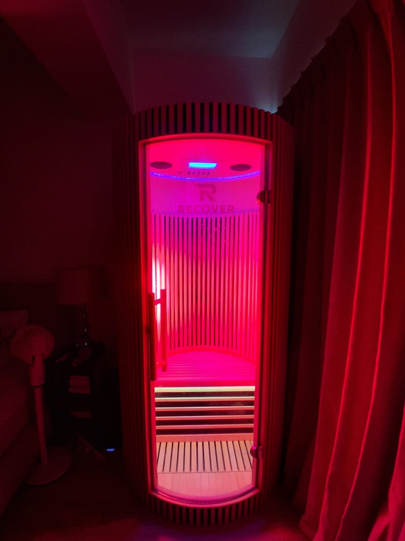 R Sauna Circle in red light in a bedroom