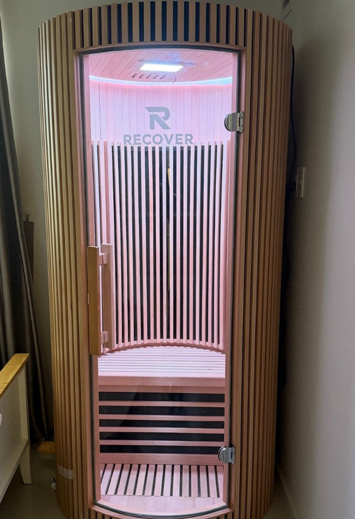 R Sauna Circle in pink light in a home in Da Nang