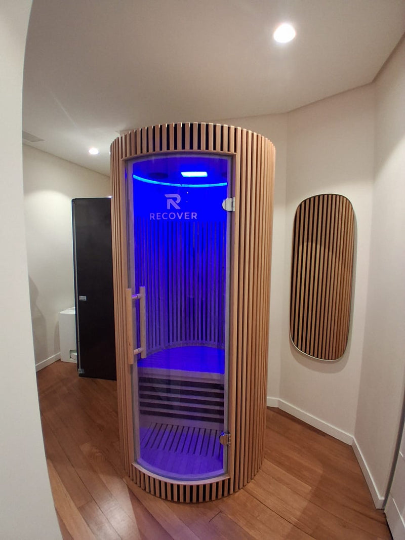 R Sauna Circle in blue light in a home in Central