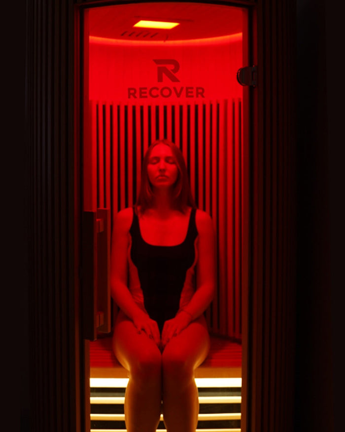 Relaxing under red light inside the R Sauna Circle