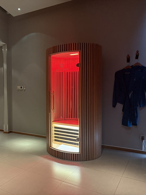 R Sauna Circle in red light in a Novotel Danang spa suite