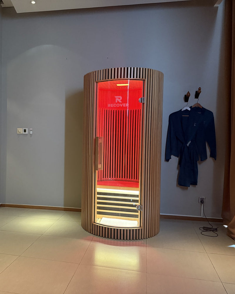 R Sauna Circle in red light in a Novotel Danang spa suite